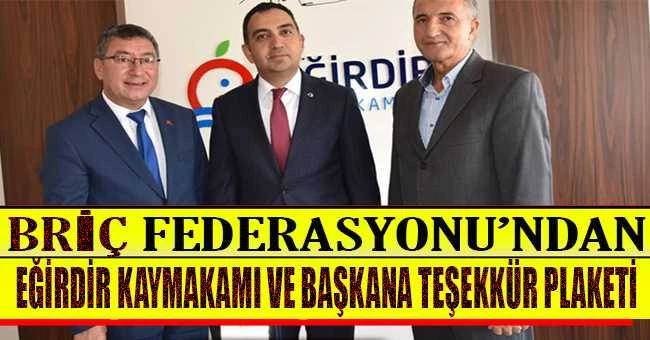BRİÇ FEDERASYONU’NDAN KAYMAKAM VE BAŞKANA TEŞEKKÜR PLAKETİ