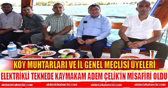 KÖY MUHTARLARI VE İL GENEL MECLİSİ ÜYELERİ ELEKTRİKLİ TEKNEDE KAYMAKAM ADEM ÇELİK’İN MİSAFİRİ OLDU
