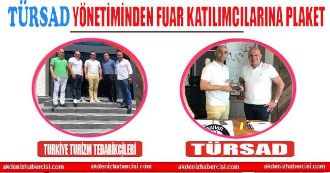 TÜRSAD YÖNETİMİNDEN FUAR KATILIMCILARINA PLAKET